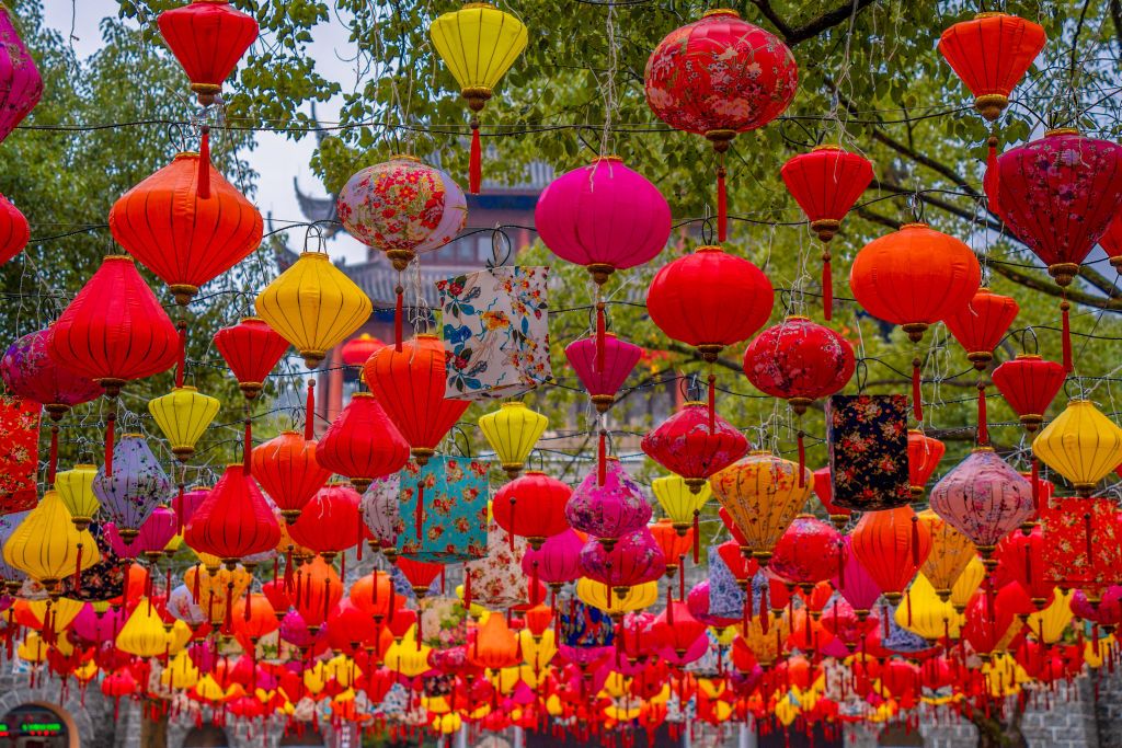 XINCHANG, CHINA - JANUARY 28: Colorful lanterns are seen at the Dafo Temple ahead of Chinese New Year on January 28, 2022 in Xinchang County, Shaoxing City, Zhejiang Province of China. (Photo by Pan Weifeng/VCG via Getty Images)