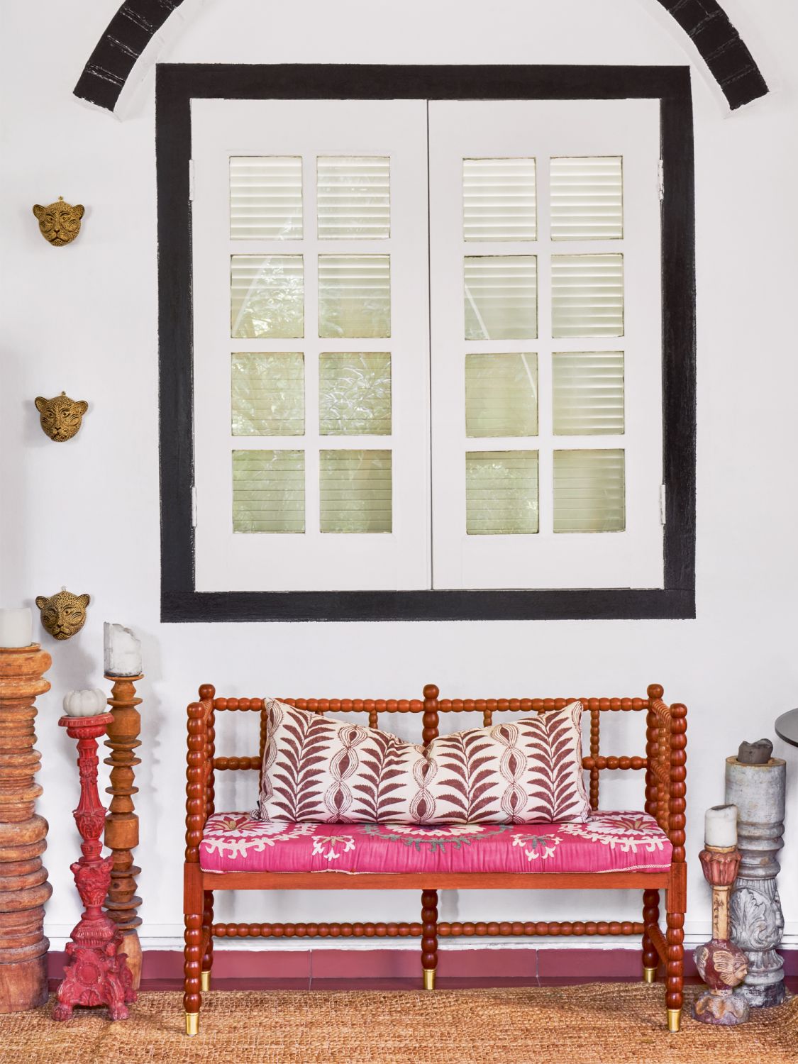 This intricate bench and cushions were designed by Ale Mora and made by various craftsmen