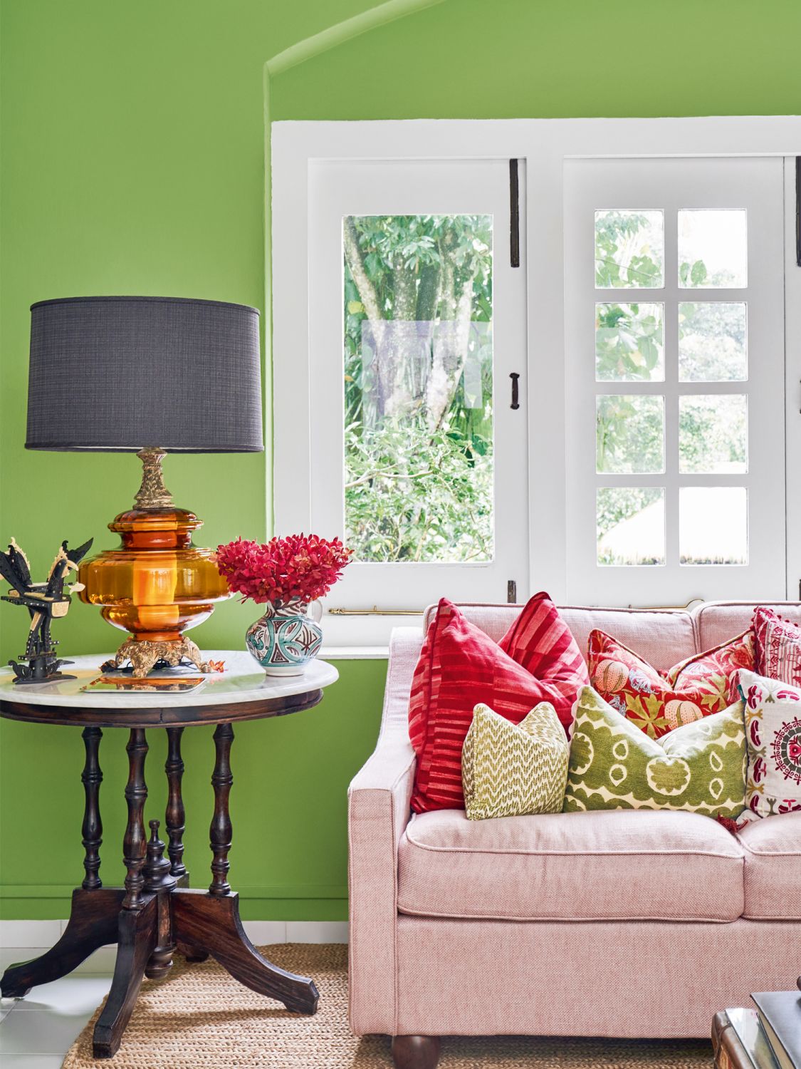 Cushions in an array of fabrics including mola, a handmade textile from Colombia and Panama