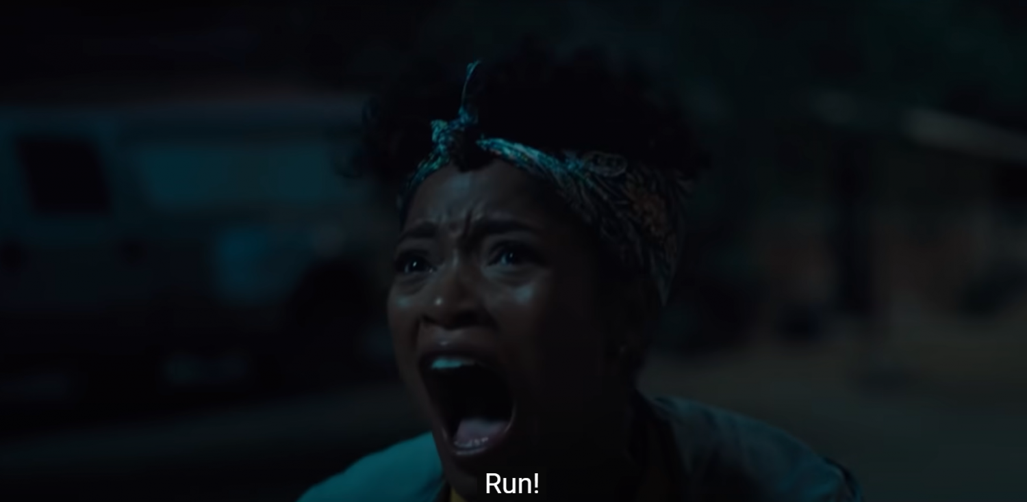 Keke Palmer's character looks up the sky and screams 'RUN!' (Photo: NOPE trailer)