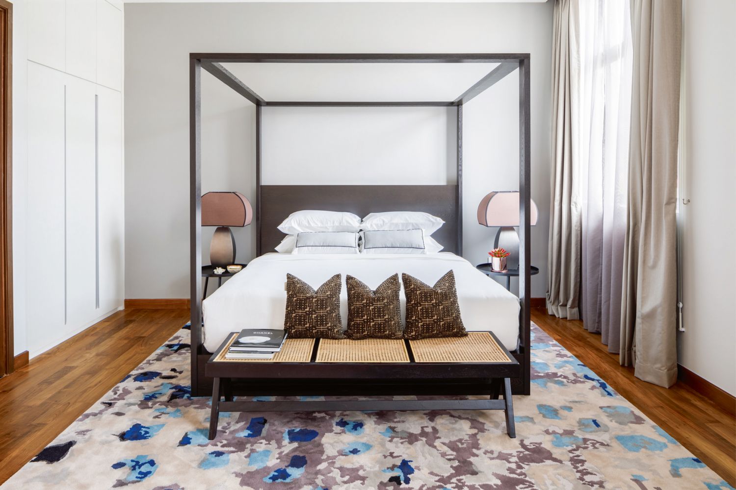 The junior master bedroom of a Good Class Bungalow by Designworx Interior Consultant