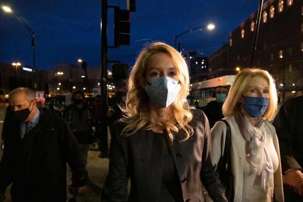 SAN JOSE, CA - JANUARY 3: Theranos founder and former CEO Elizabeth Holmes (C) and her mother Noel Holmes leave the Robert F. Peckham Federal Building on January 3, 2022 in San Jose, California. A jury found Elizabeth Holmes guilty on three counts of wire fraud and one count of conspiracy to defraud investors. (Photo by David Odisho/Getty Images)