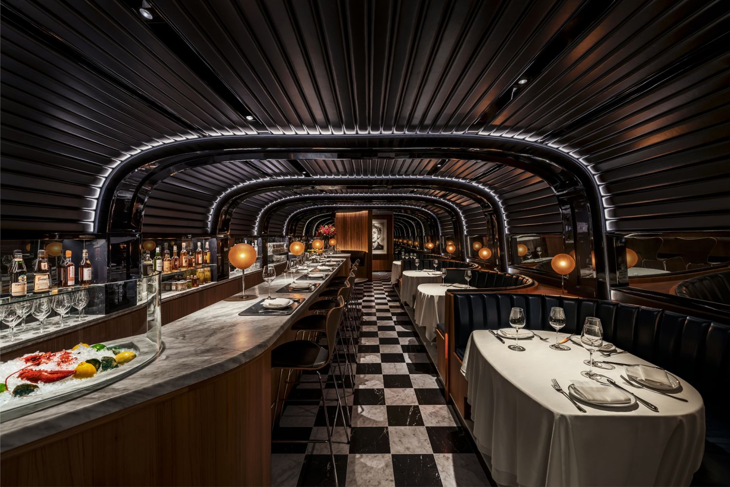 Designed by Perinelli Design, The Clubroom exudes a luxe atmosphere with Art Deco influences