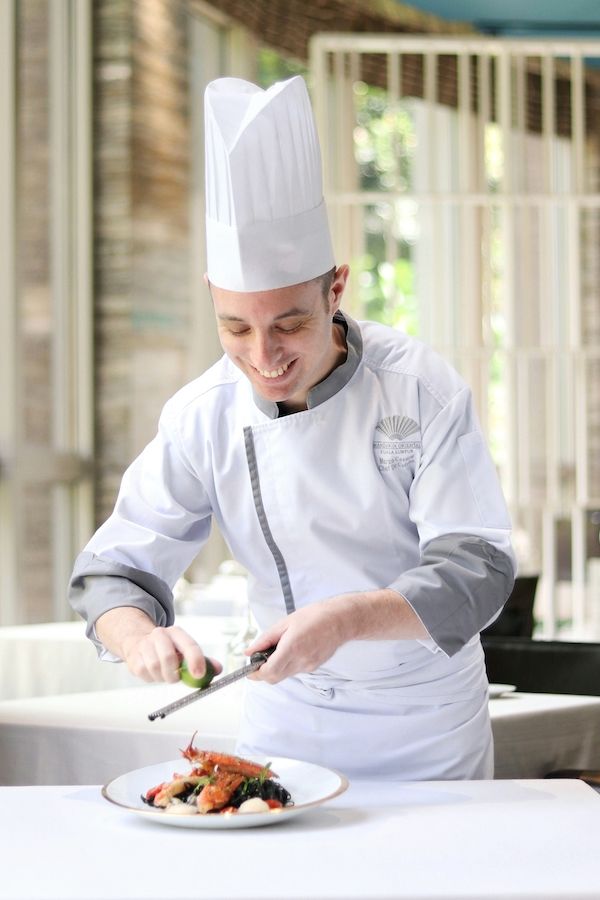 Chef Marco preparing the Tagliolini Al Nero Con Astice