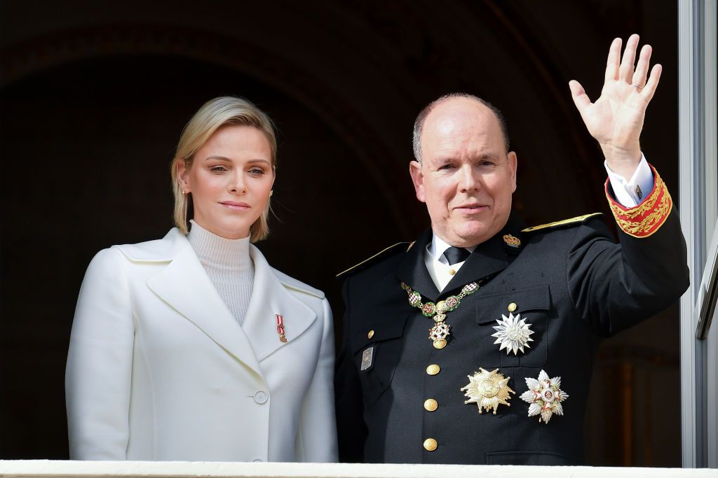 MONTE-CARLO, MONACO - NOVEMBER 19:  Princess Charlene of Monaco and Prince Albert II of Monaco pose at the Palace balcony during the Monaco National Day Celebrations on November 19, 2019 in Monte-Carlo, Monaco. (Photo by Stephane Cardinale - Corbis/Corbis via Getty Images)