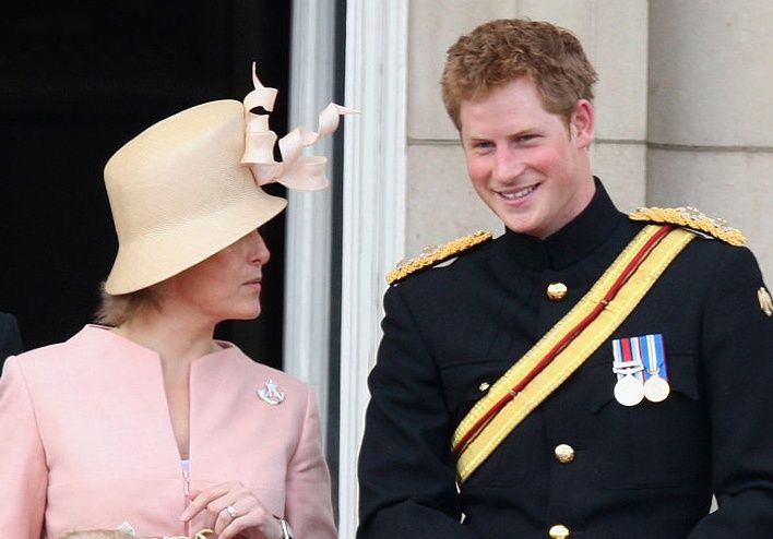 LONDON, ENGLAND - JUNE 13: TRH Prince Harry, Lady Louise Windsor and her mother Sophie, Countess of Wessex look out from the balcony of Buckingham Palace after the Trooping the Colour ceremony on June 13, 2009 in London, England. The ceremony of Trooping the Colour is believed to have first been performed during the reign of King Charles II. In 1748, it was decided that the parade would be used to mark the official birthday of the Sovereign. More than 600 guardsmen and cavalry make up the parade, a celeb