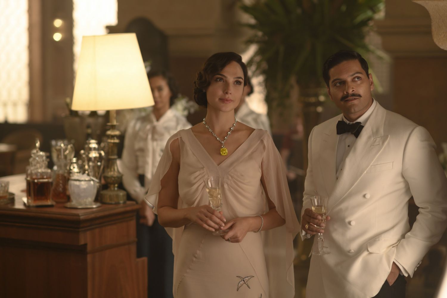 Gal Gadot as Linnet Ridgeway and Ali Fazal as Andrew Katchadourian in 20th Century Studios’ DEATH ON THE NILE, a mystery-thriller directed by Kenneth Branagh based on Agatha Christie’s 1937 novel. Photo by Rob Youngson. © 2020 Twentieth Century Fox Film Corporation. All Rights Reserved.