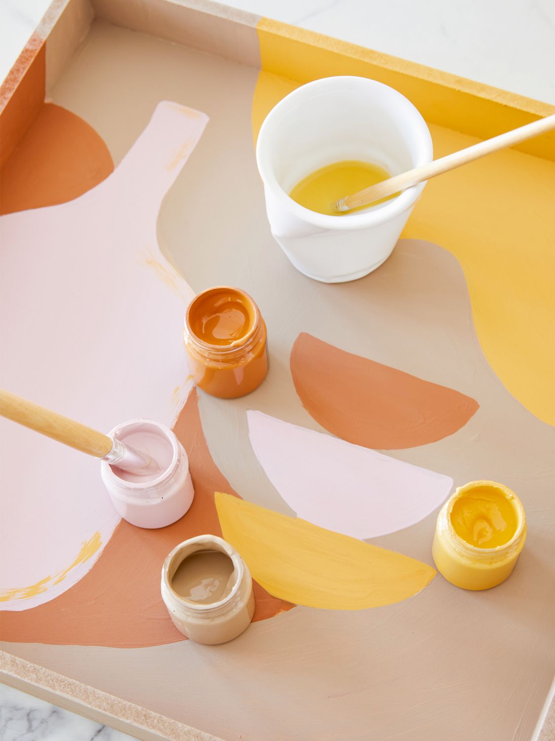 Transform an ordinary tray by layering colour with patterns