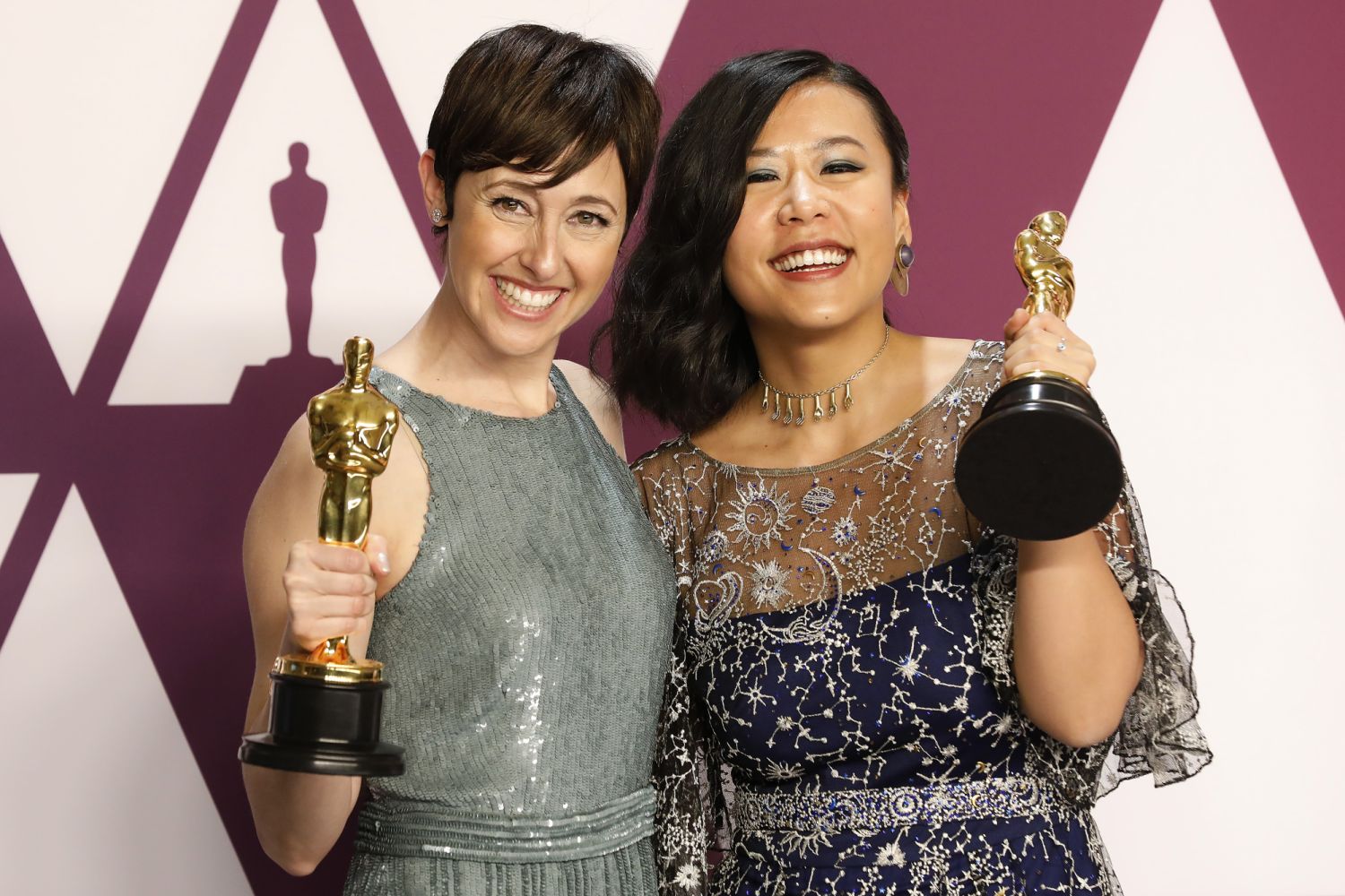 HOLLYWOOD, CALIFORNIA - FEBRUARY 24: Becky Neiman-Cobb (L) and Domee Shi, (Winners of Best Animated Short Film for 'Bao,') pose in the press room at the 91st Annual Academy Awards at the Dolby Theatre in Hollywood, California on February 24, 2019. (Photo credit should read John Rasimus / Barcroft Media via Getty Images)