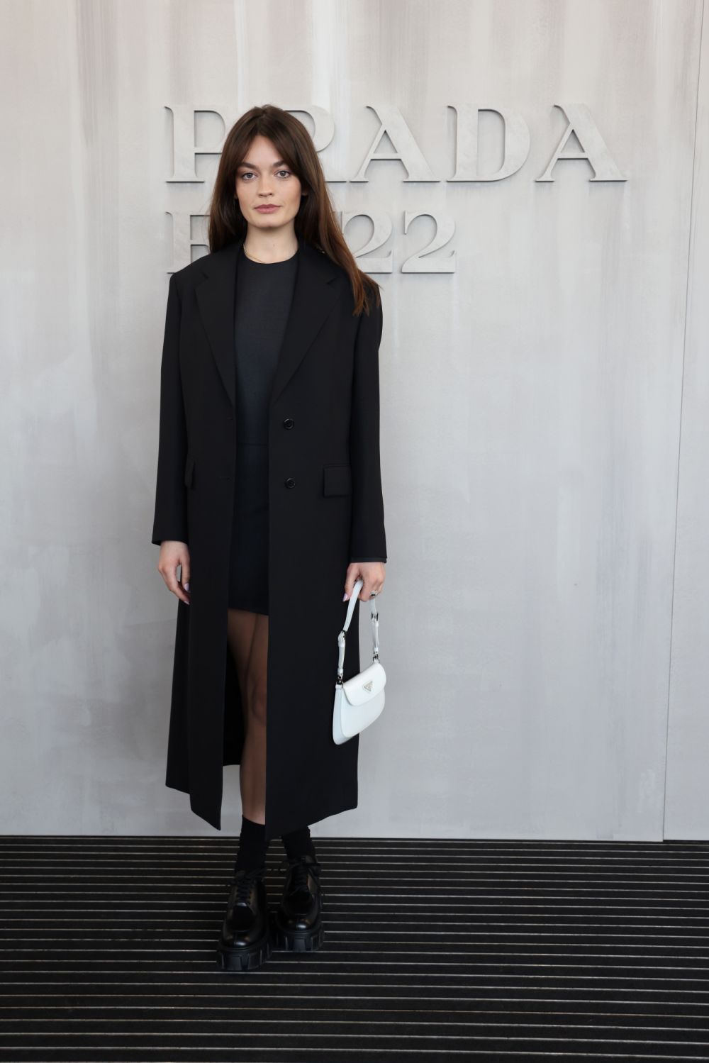 MILAN, ITALY - FEBRUARY 24: Emma Mackey attends Prada Fall 2022 Womenswear Fashion Show on February 24, 2022 in Milan, Italy. (Photo by Vittorio Zunino Celotto/Getty Images for Prada)