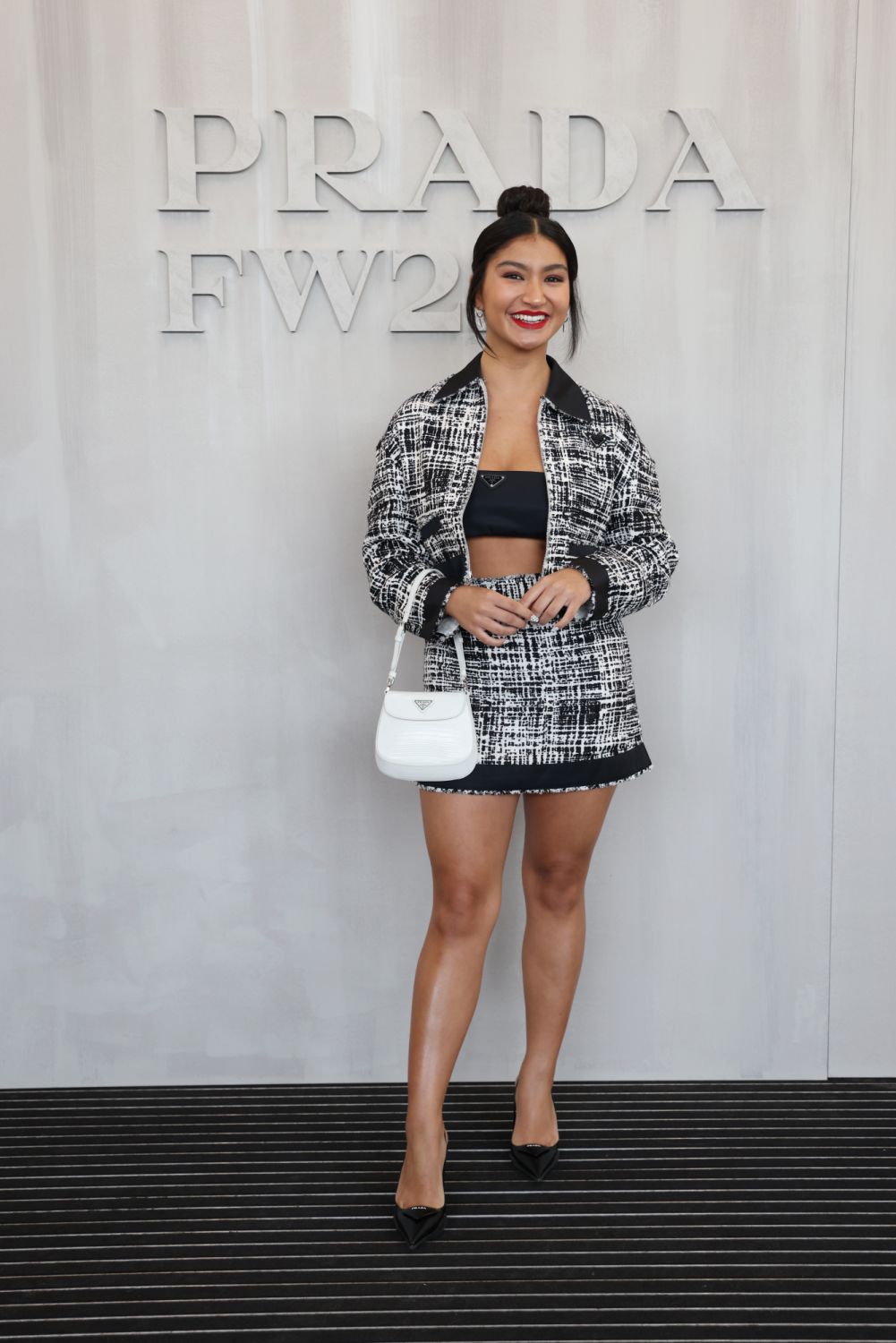 MILAN, ITALY - FEBRUARY 24: Deja Foxx  attends Prada Fall 2022 Womenswear Fashion Show on February 24, 2022 in Milan, Italy. (Photo by Vittorio Zunino Celotto/Getty Images for Prada)