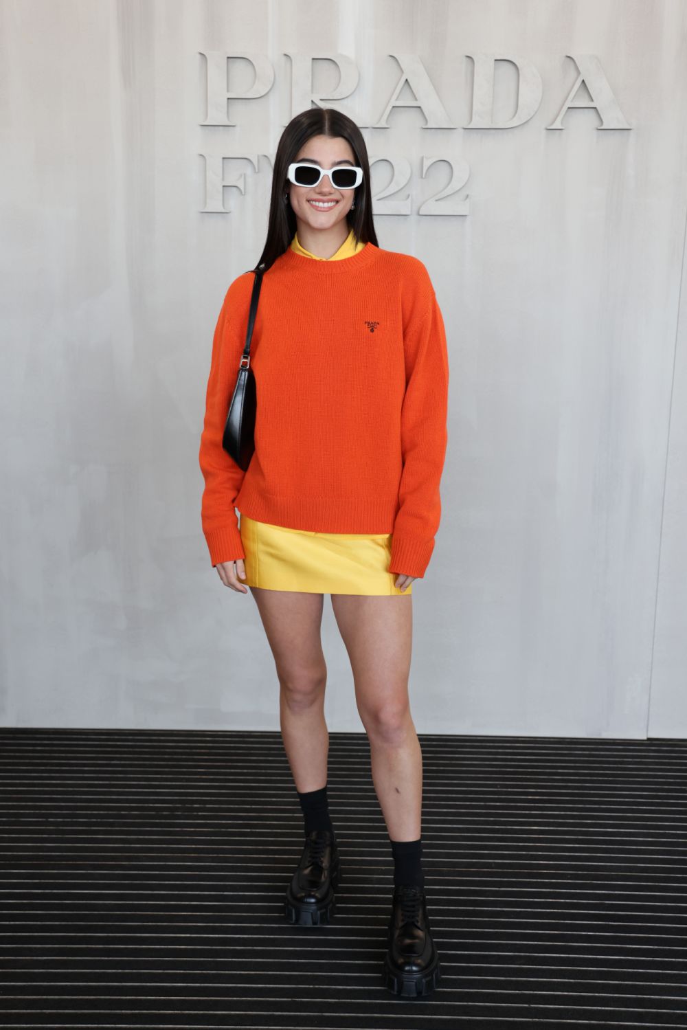 MILAN, ITALY - FEBRUARY 24: Charli D'Amelio attends Prada Fall 2022 Womenswear Fashion Show on February 24, 2022 in Milan, Italy. (Photo by Vittorio Zunino Celotto/Getty Images for Prada)