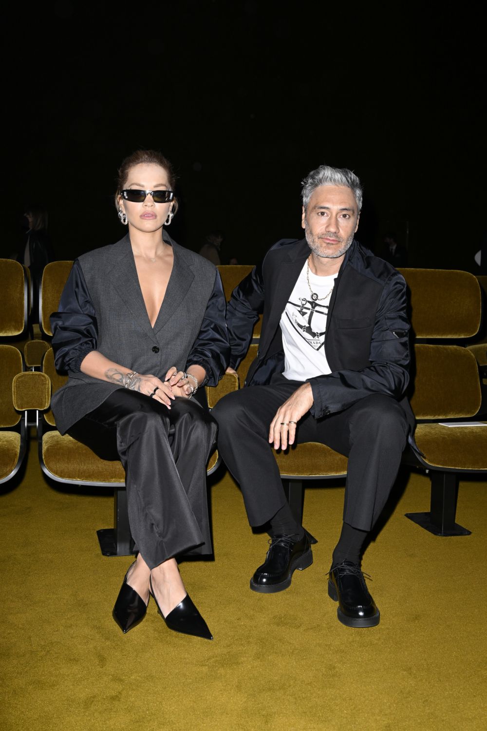 MILAN, ITALY - FEBRUARY 24: Rita Ora and Taika Waititi attend Prada Fall 2022 Womenswear Fashion Show on February 24, 2022 in Milan, Italy. (Photo by Pietro S. D'Aprano/Getty Images for Prada)
