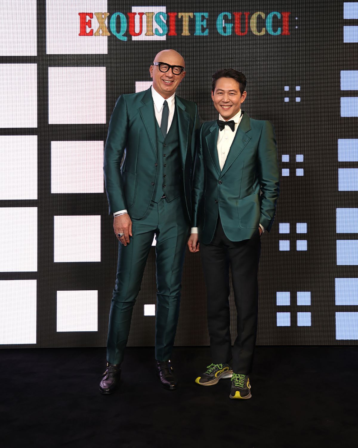 MILAN, ITALY - FEBRUARY 25: Marco Bizzarri and Jungjae Lee arrive at the Gucci show during Milan Fashion Week Fall/Winter 2022/23 on February 25, 2022 in Milan, Italy. (Photo by Vittorio Zunino Celotto/Getty Images for Gucci)