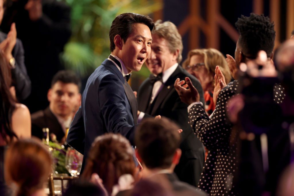 SANTA MONICA, CALIFORNIA - FEBRUARY 27: Lee Jung-jae wins the award for Male Actor in a Drama Series for 'Squid Game' during the 28th Annual Screen Actors Guild Awards at Barker Hangar on February 27, 2022 in Santa Monica, California. (Photo by Rich Fury/Getty Images)