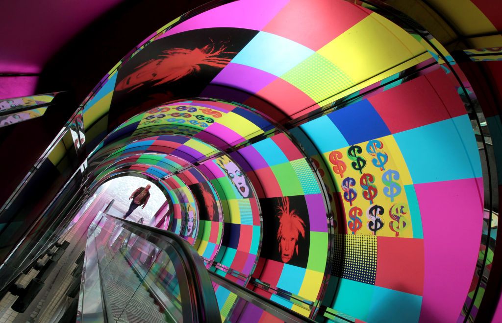 The escalator of Hong Kong Museum of Art in Tsim Sha Tsui is decorated with works of artist Andy Warhol. 14DEC12 (Photo by K. Y. Cheng/South China Morning Post via Getty Images)