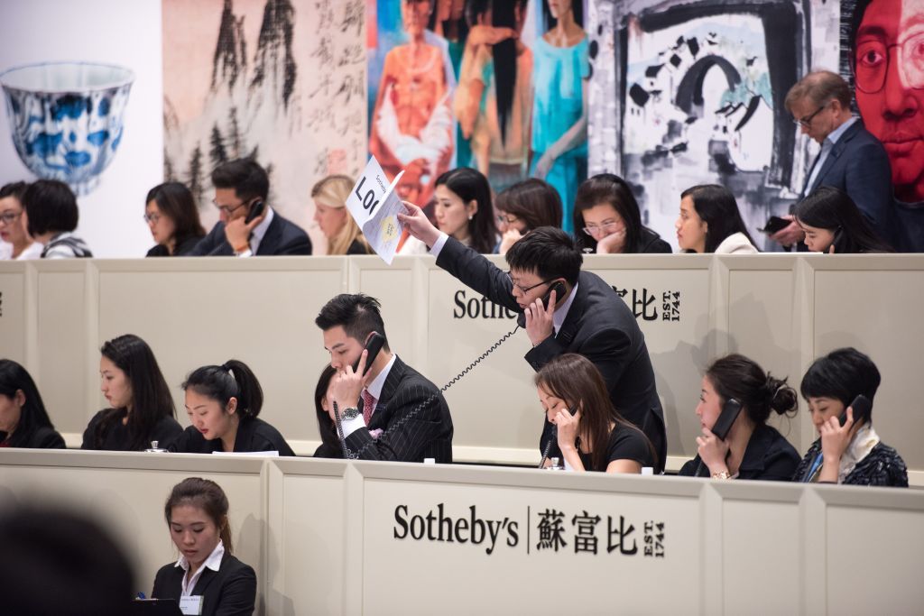 HONG KONG, CHINA - APRIL 02: Andy Warhol's screen print sells for $HKD86 million ($USD 11 068 200) at the Spring auction in the HKCEC Hong Kong, Hong Kong SAR, China on April 02, 2017. Andy Warhol's 'Mao' screen print comes up for auction at Sotheby's. (Photo by Jayne Russell/Anadolu Agency/Getty Images)