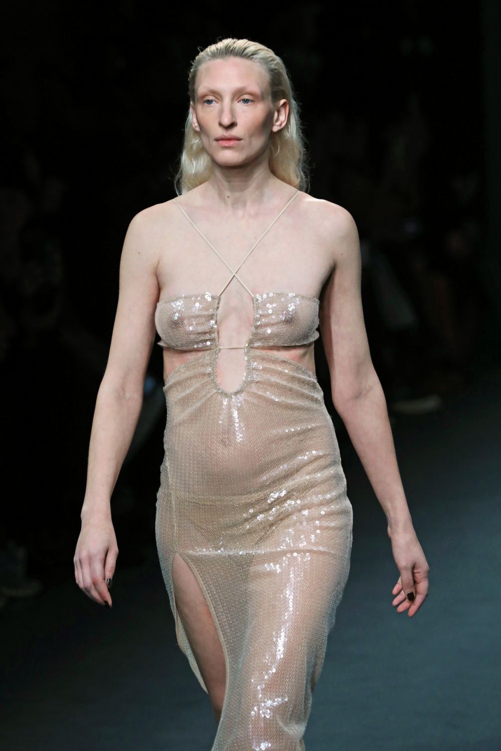 LONDON, ENGLAND - FEBRUARY 19: A model walks the runway at the Nensi Dojaka AW22 Show during London Fashion Week February 2022 at the BFC NEWGEN Show Space on February 19, 2022 in London, England. (Photo by David M. Benett/Dave Benett/Getty Images)