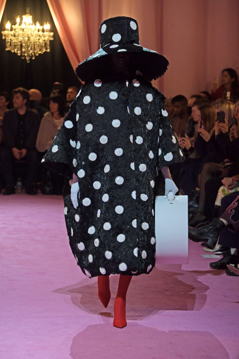 LONDON, ENGLAND - FEBRUARY 19: A model walks the runway at the Richard Quinn AW22 show during London Fashion Week February 2022 on February 19, 2022 in London, England. (Photo by David M. Benett/Dave Benett/Getty Images)