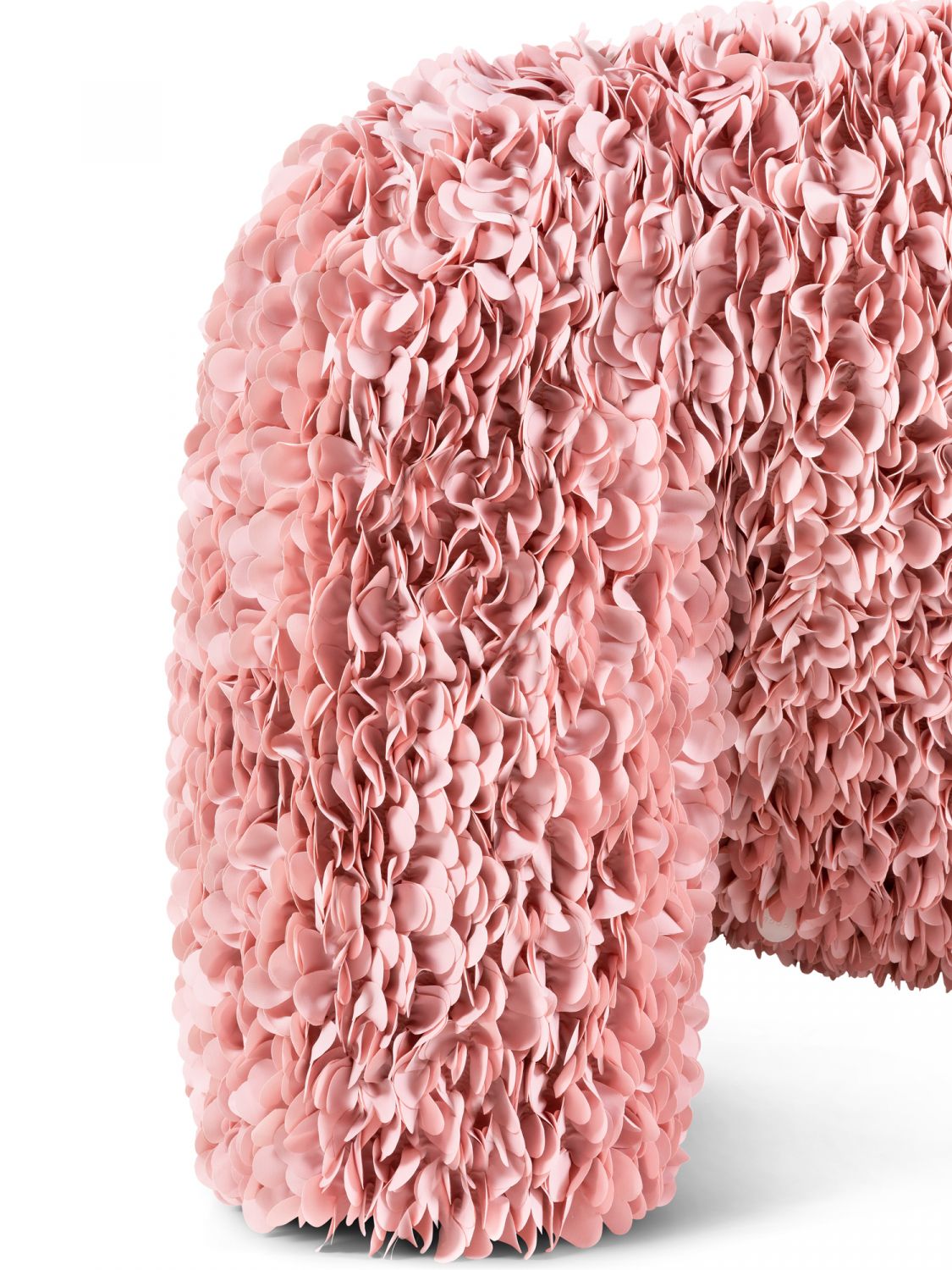 To prevent the petals from creasing, lightweight polyester is laser-cut into strips