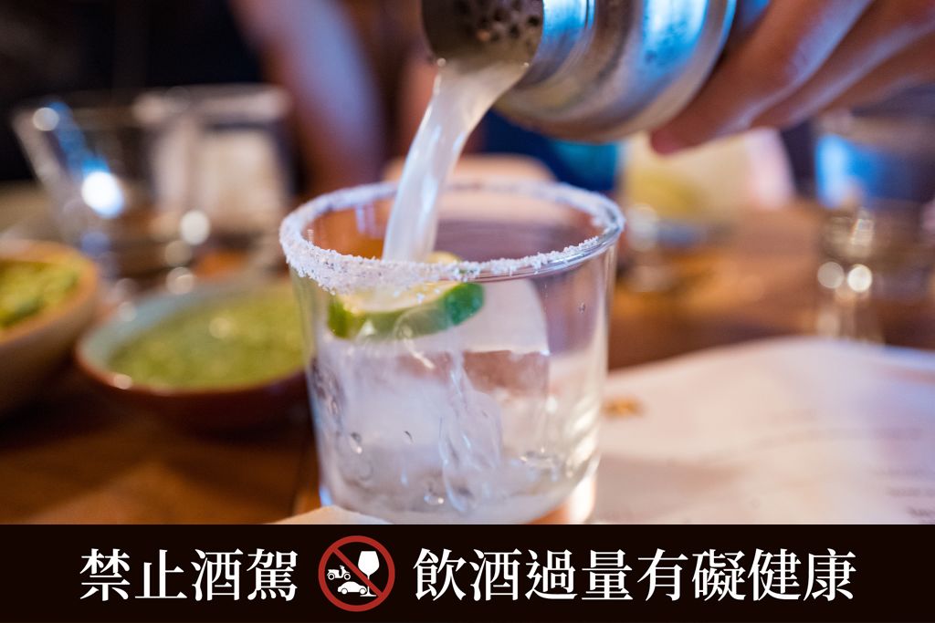 Close-up of hand of a man pouring the signature Copita margarita into a salt rimmed glass at Copita Mexican cuisine restaurant in Sausalito, California, August 5, 2018. (Photo by Smith Collection/Gado/Getty Images)
