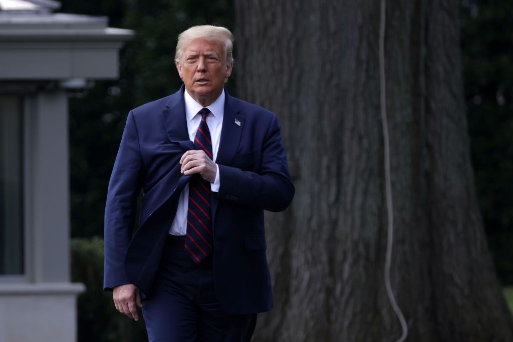 WASHINGTON, DC - JULY 27: U.S. President Donald Trump walks towards members of the press prior to his departure from the White House July 27, 2020 in Washington, DC. President Trump is scheduled to visit the FUJIFILM Diosynth Biotechnologies' Innovation Center in Morrisville, North Carolina, a facility that supports manufacturing of "key components of the COVID-19 vaccine candidate" developed by Novavax. (Photo by Alex Wong/Getty Images)