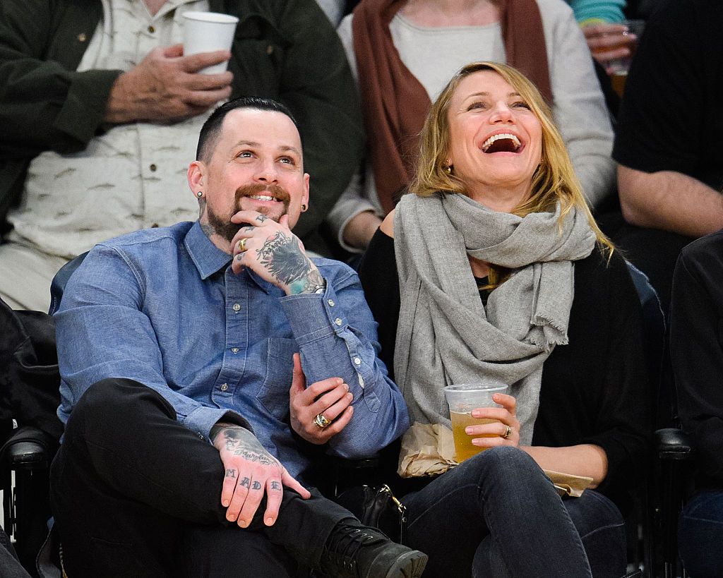 LOS ANGELES, CA - JANUARY 27:  Benji Madden (L) and Cameron Diaz attend a basketball game between the Washington Wizards and the Los Angeles Lakers at Staples Center on January 27, 2015 in Los Angeles, California.  (Photo by Noel Vasquez/GC Images)