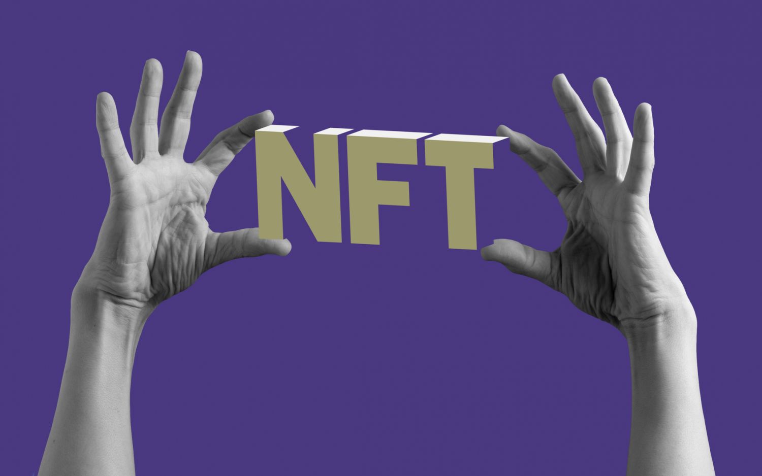 Hands holding NFT againct purple background.