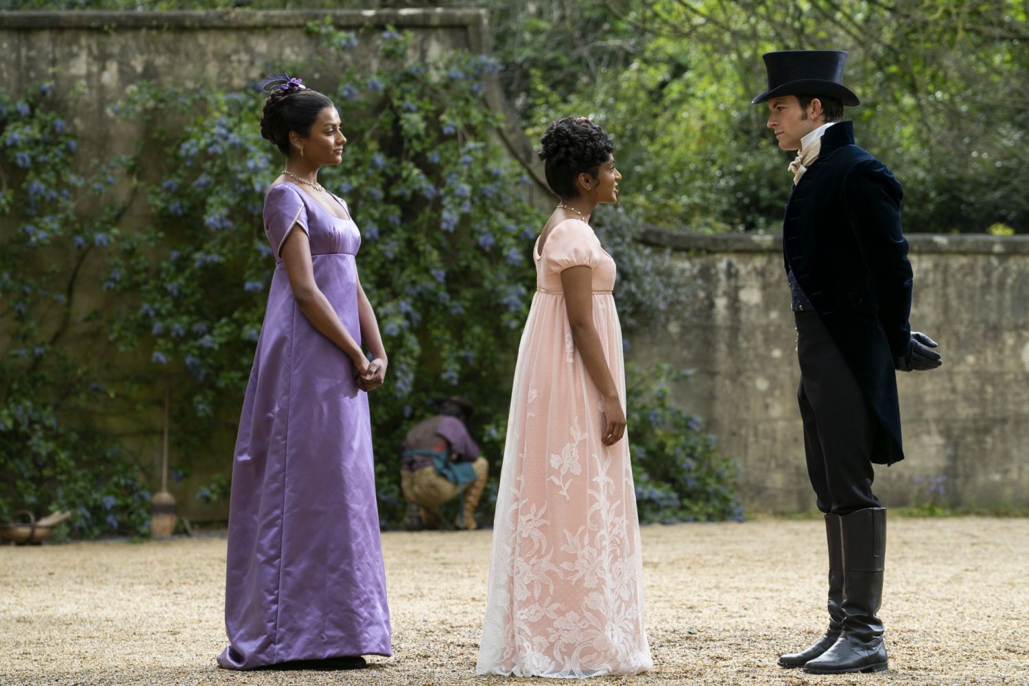 Bridgerton. (L to R) Simone Ashley as Kate Sharma, Charithra Chandran as Edwina Sharma, Jonathan Bailey as Anthony Bridgerton in episode 202 of Bridgerton. Cr. Liam Daniel/Netflix © 2022
