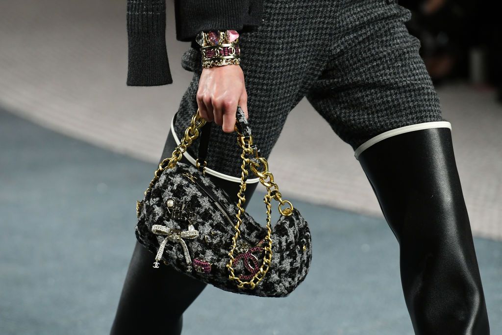 PARIS, FRANCE - MARCH 08: (EDITORIAL USE ONLY - For Non-Editorial use please seek approval from Fashion House) A model, fashion detail, walks the runway during the Chanel Womenswear Fall/Winter 2022-2023 show as part of Paris Fashion Week on March 08, 2022 in Paris, France. (Photo by Dominique Charriau/WireImage)