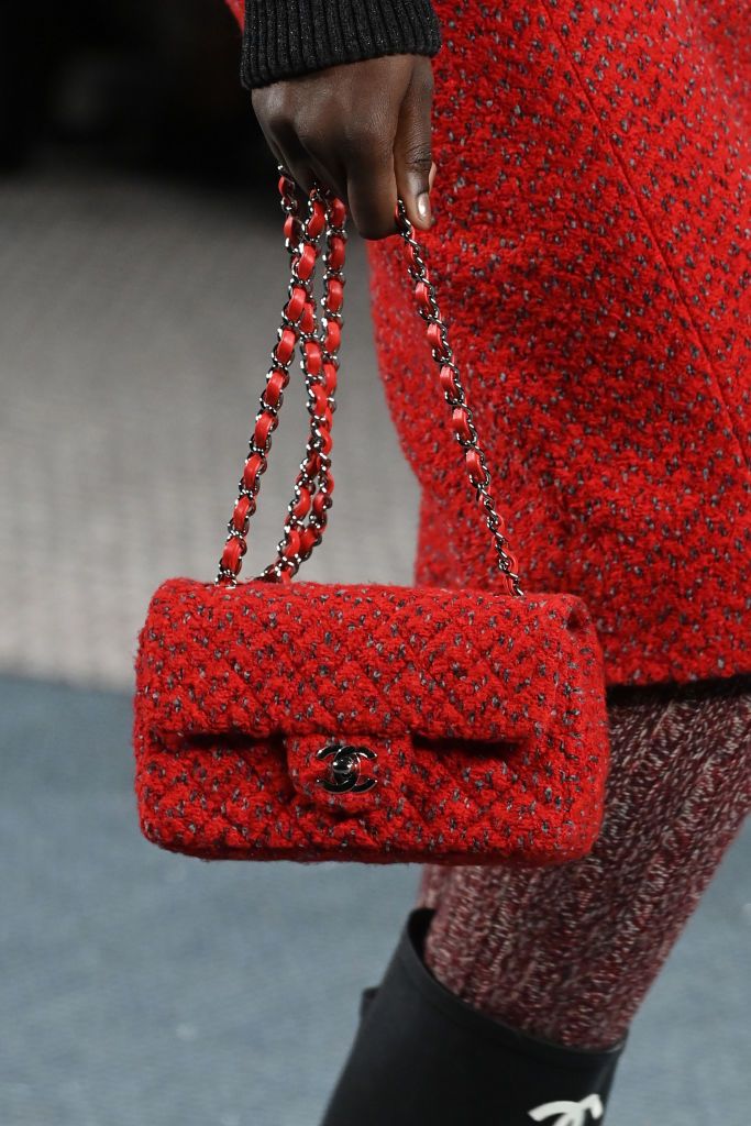 PARIS, FRANCE - MARCH 08: (EDITORIAL USE ONLY - For Non-Editorial use please seek approval from Fashion House) A model, bag detail, walks the runway during the Chanel Womenswear Fall/Winter 2022-2023 show as part of Paris Fashion Week on March 08, 2022 in Paris, France. (Photo by Pascal Le Segretain/Getty Images)