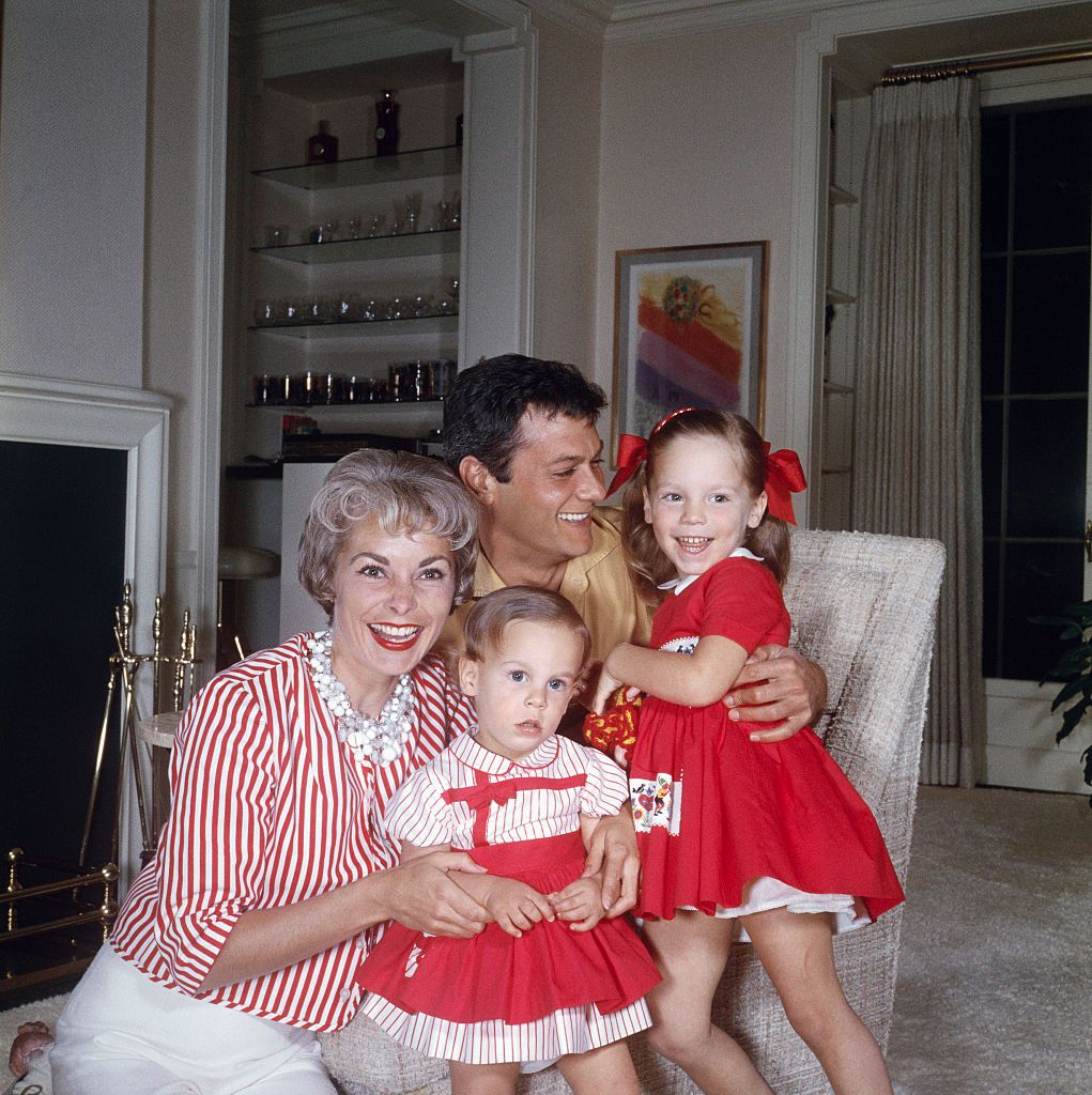 (Original Caption) Tony Curtis and Janet Leigh with their two daughters, Jamie Lee and Kelly Lee.