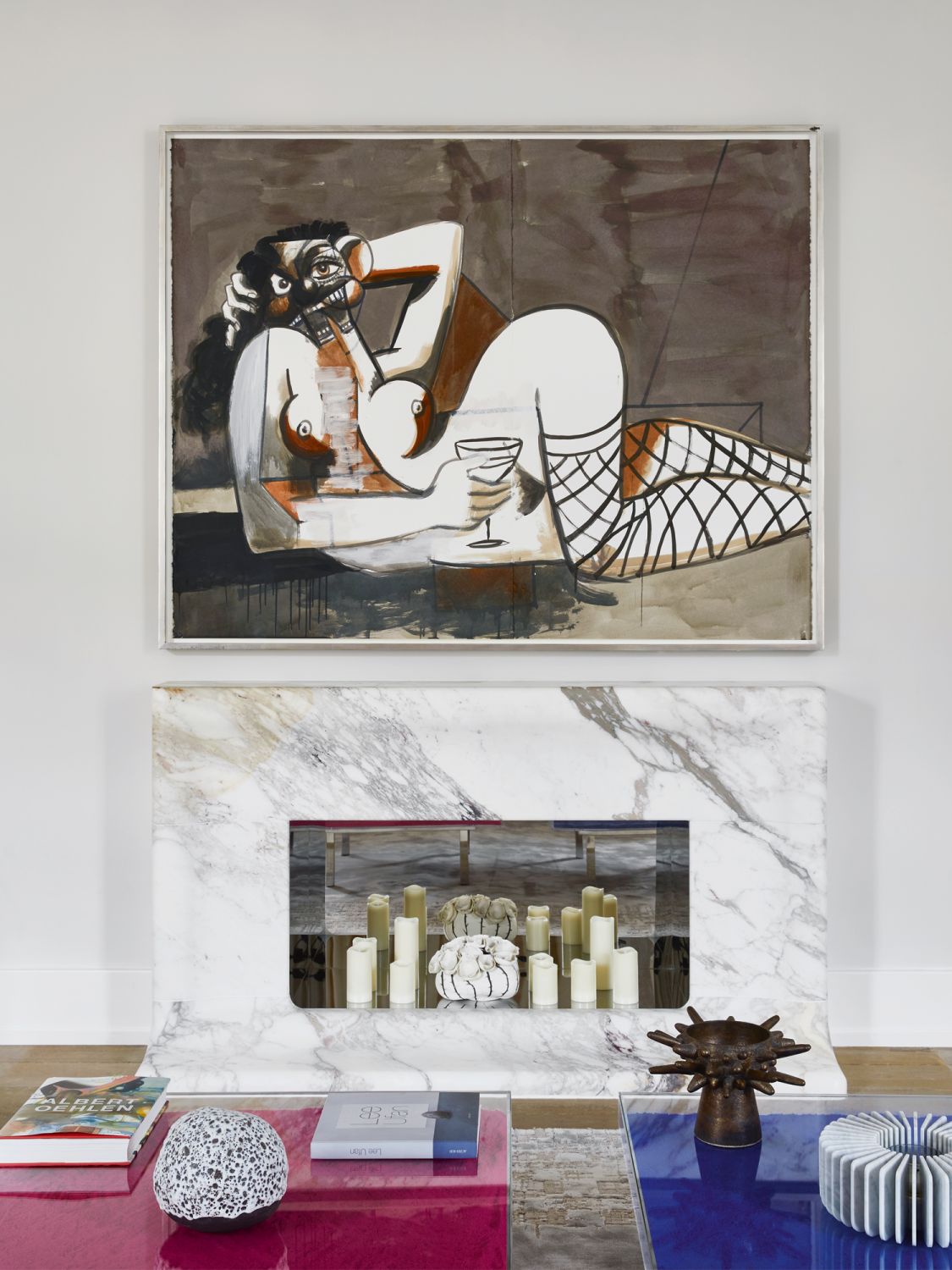 A painting by George Condo is one of the eye-catching pieces in the living area