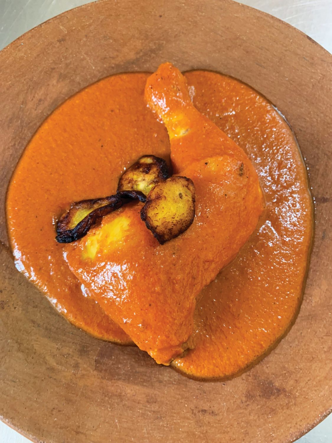 Chicken mole mancha manteles (Photo: Angelo Comsti)