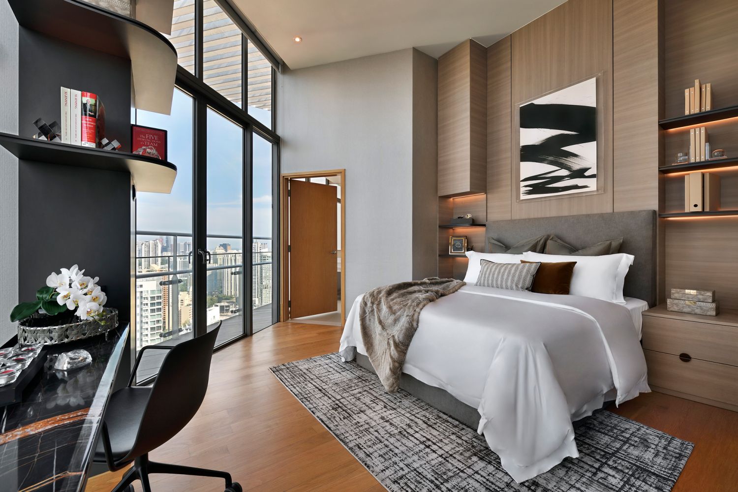 The beige tones and light wood in the bedroom create a calming mood