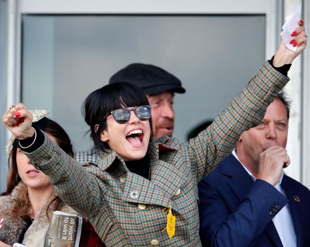 CHELTENHAM, UNITED KINGDOM - MARCH 13: (EMBARGOED FOR PUBLICATION IN UK NEWSPAPERS UNTIL 24 HOURS AFTER CREATE DATE AND TIME) Lily Allen watches the racing as she attends day 4 'Gold Cup Day' of the Cheltenham Festival 2020 at Cheltenham Racecourse on March 13, 2020 in Cheltenham, England. (Photo by Max Mumby/Indigo/Getty Images)