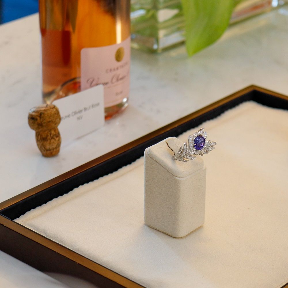 Infiniti Jewels Bubbling Over Party event for investment grade gems