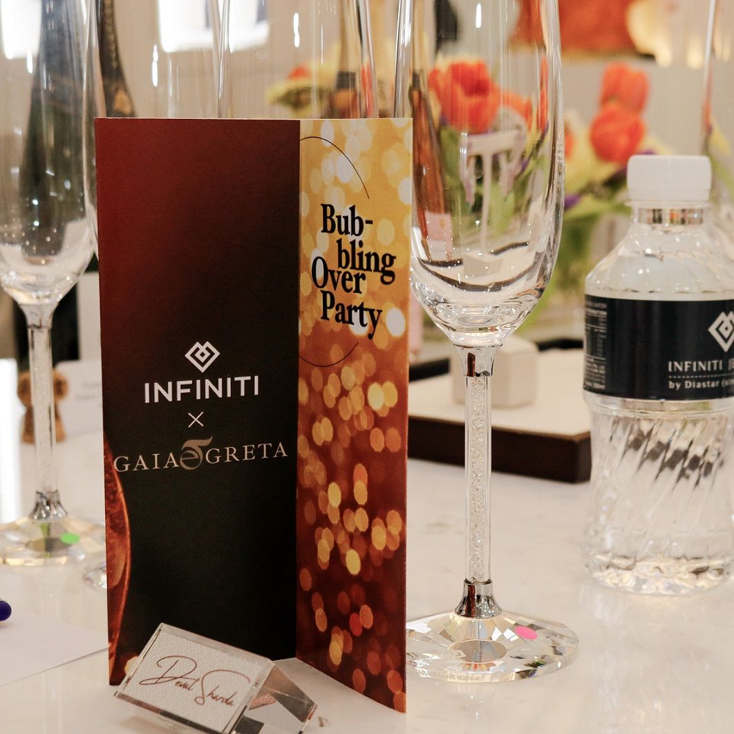 Infiniti Jewels Bubbling Over Party event for investment grade gems