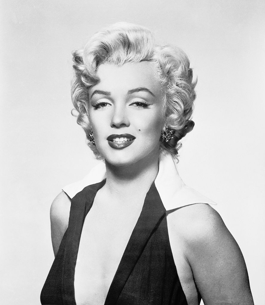 (Original Caption) USA: Marilyn Monroe wearing a halter dress in the shot made famous by artist Andy Warhol.