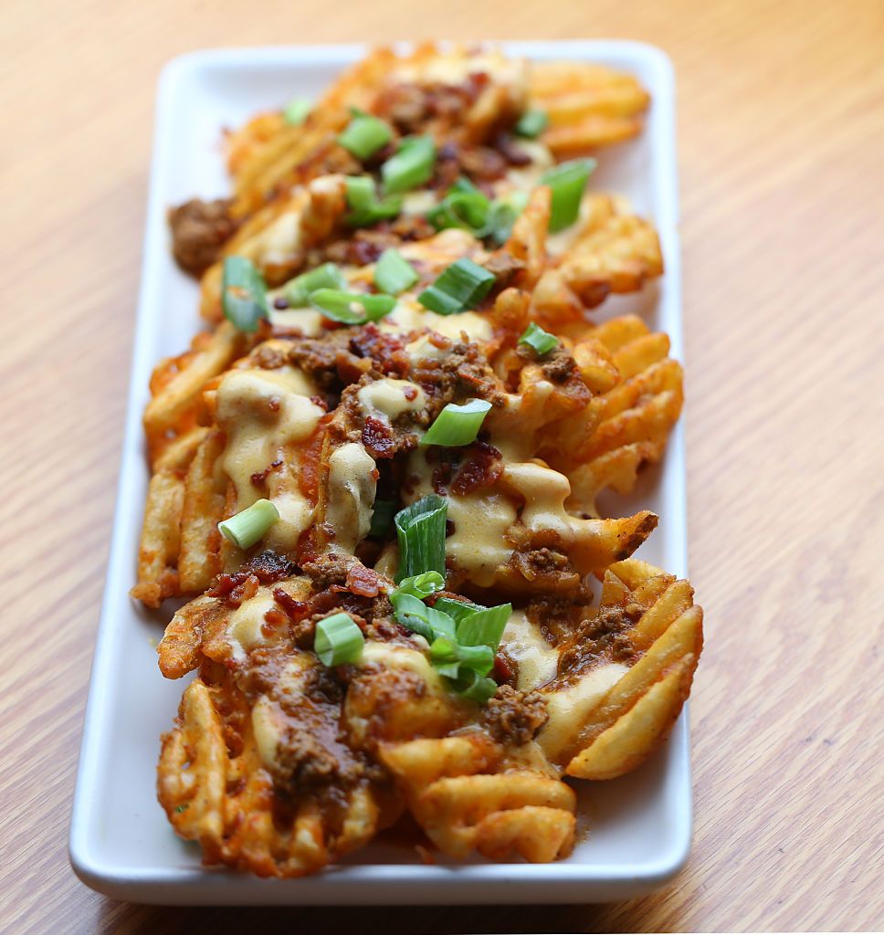 CAMBRIDGE, MA - MAY 27: Loaded waffle fries at WuBurger in Cambridge, Mass., May 27, 2016. (Photo by Jonathan Wiggs/The Boston Globe via Getty Images)