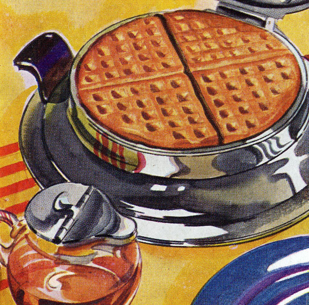 Vintage illustration of a waffle cooking in a waffle iron, with a syrup dispenser; screen print, 1940s. (Photo by GraphicaArtis/Getty Images)