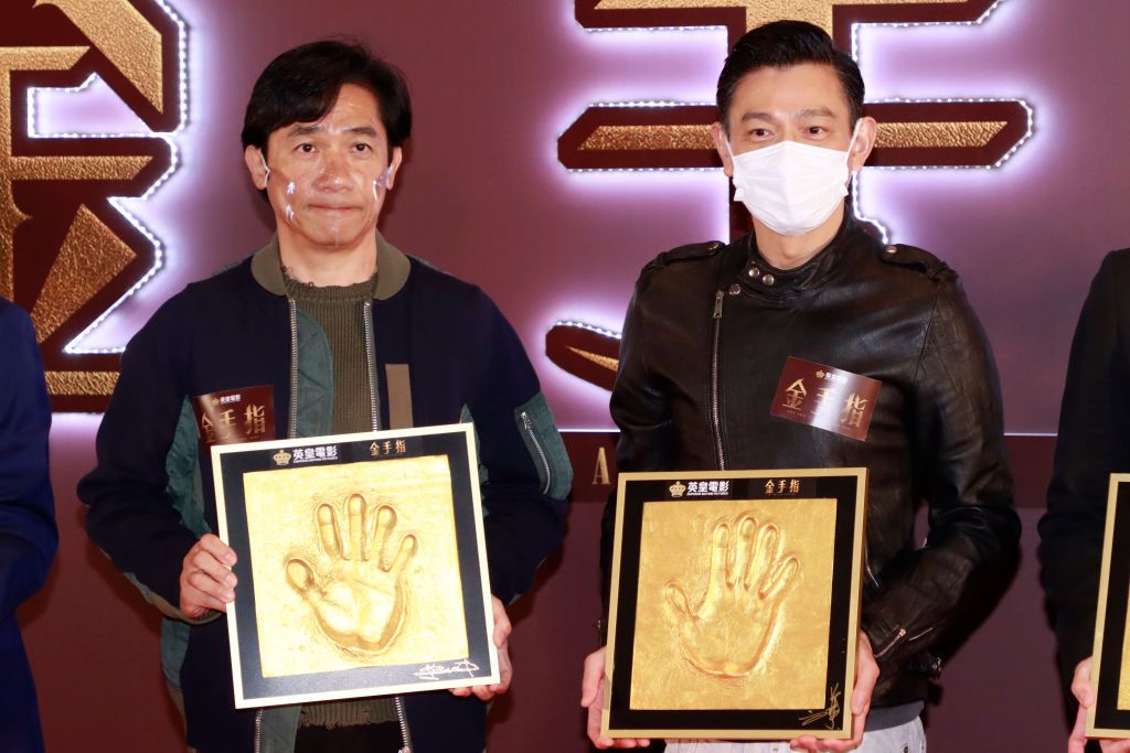 HONG KONG, CHINA - FEBRUARY 20: Actors Tony Leung Chiu-wai (L) and Andy Lau Tak-wah attend 'Once Upon A Time In Hong Kong' press conference on February 20, 2021 in Hong Kong, China. (Photo by VCG/VCG via Getty Images)