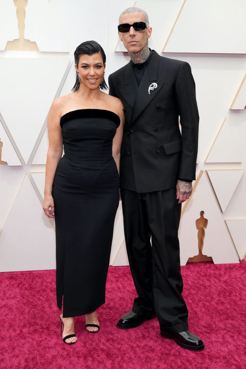 HOLLYWOOD, CALIFORNIA - MARCH 27: (L-R) Kourtney Kardashian and Travis Barker attend the 94th Annual Academy Awards at Hollywood and Highland on March 27, 2022 in Hollywood, California. (Photo by Kevin Mazur/WireImage)
