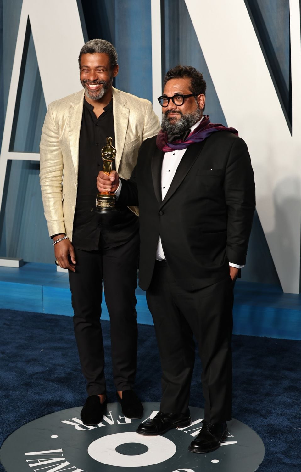 BEVERLY HILLS, CALIFORNIA - MARCH 27: Joseph Patel (R) and guest attend the 2022 Vanity Fair Oscar Party hosted by Radhika Jones at Wallis Annenberg Center for the Performing Arts on March 27, 2022 in Beverly Hills, California. (Photo by Arturo Holmes/FilmMagic)