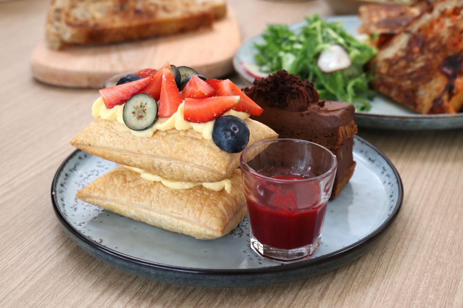 Sake Mille Feuille with Berries & Seasonal Fruits and Callebaut Dark Chocolate Ganache  with Salted Gula Melaka