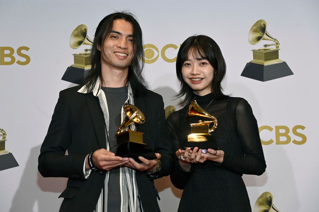 LAS VEGAS, NEVADA - APRIL 03: Li Jheng Han and Yu Wei winners for the Best Recording Package Award for 'Pakelang' pose in the winners photo room during the 64th Annual GRAMMY Awards at MGM Grand Garden Arena on April 03, 2022 in Las Vegas, Nevada. (Photo by David Becker/Getty Images for The Recording Academy)