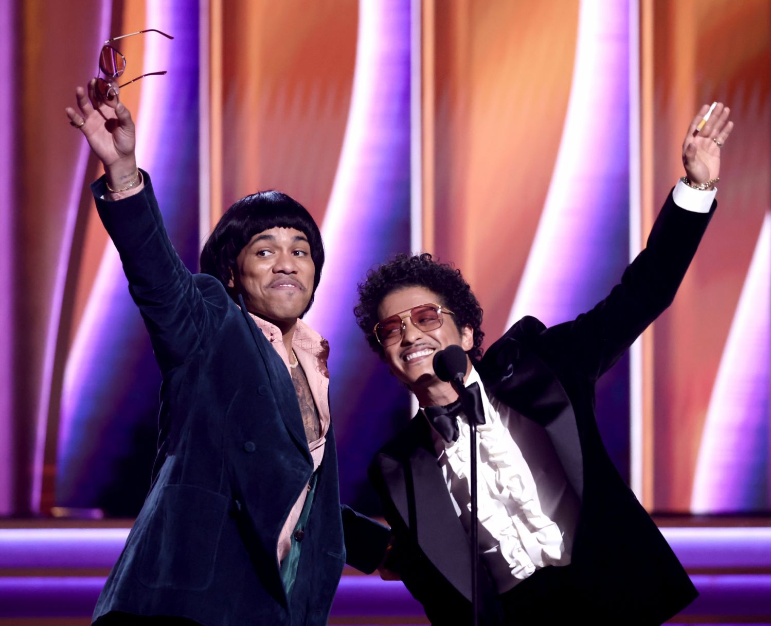 LAS VEGAS, NEVADA - APRIL 03: (L-R) Anderson .Paak and Bruno Mars of Silk Sonic accept Record Of The Year award for âLeave The Door Openâ onstage during the 64th Annual GRAMMY Awards at MGM Grand Garden Arena on April 03, 2022 in Las Vegas, Nevada. (Photo by Emma McIntyre/Getty Images for The Recording Academy)