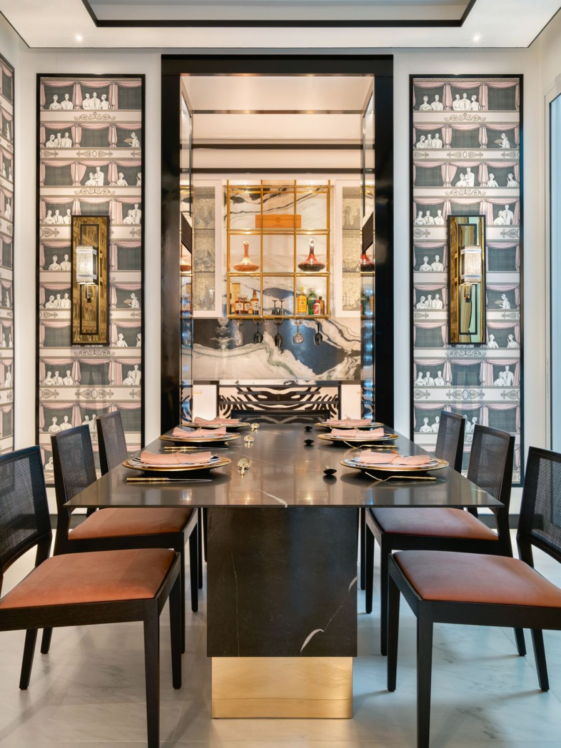 The Teatro wallpaper from Cole & Son’s Fornasetti Senza Tempo collection in the dining room is among the nods to the oeuvre of Italian artist Piero Fornasetti