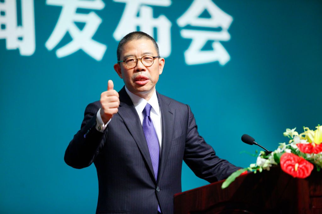 BEIJING, CHINA - MAY 06: Zhong Shanshan, founder and chairman of bottled water company Nongfu Spring, thumbs up at a Nongfu Spring press conference on May 6, 2013 in Beijing, China. (Photo by VCG/VCG via Getty Images)