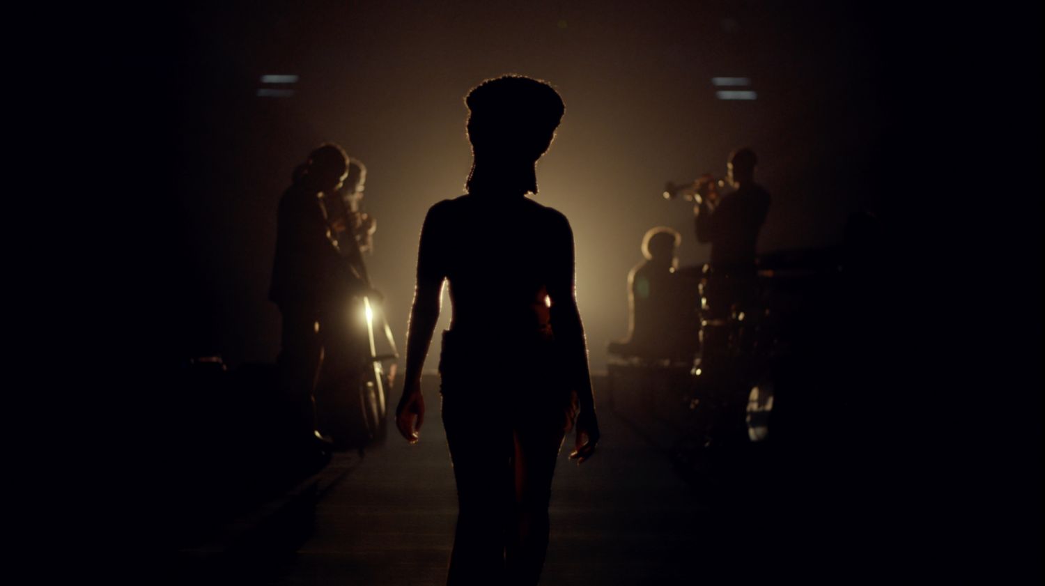 The silhouette of Mother Earth as she walks into the light, symbolising planet Earth turning towards the sun.